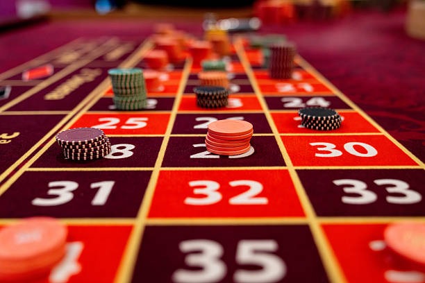 Live baccarat action Live-dealer baccarat table with real dealer and player cards