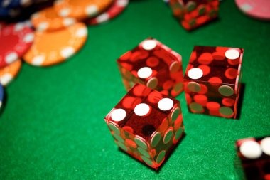 Live dealer managing French Roulette spin with multi-camera studio view